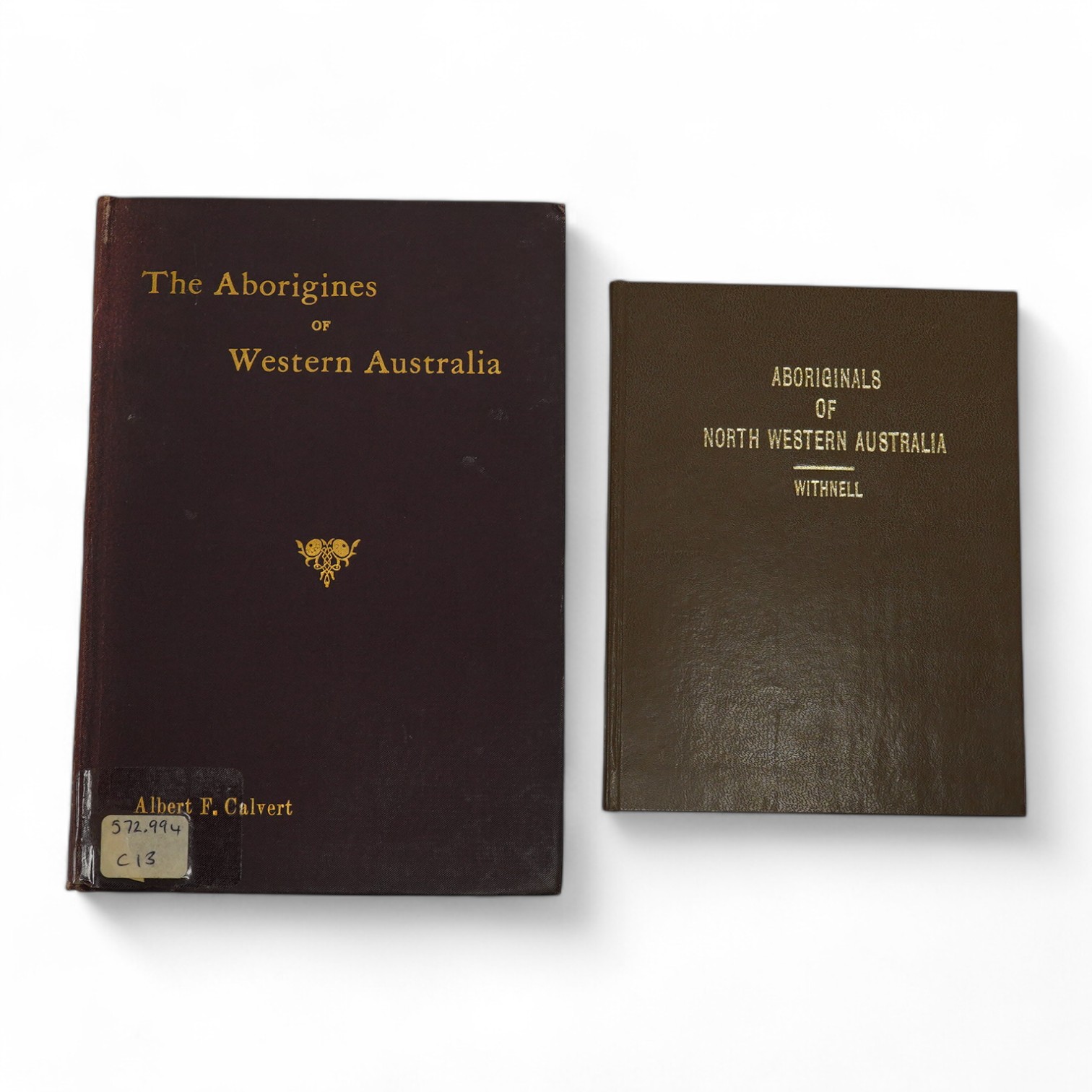 Calvert, Albert F. – The Aborigines of Western Australia, 1894, original cloth and Withnell, John G. - The Aboriginal Natives of North Western Australia, 1965 reprint, both Ex. Brighton Library with stamps (2)